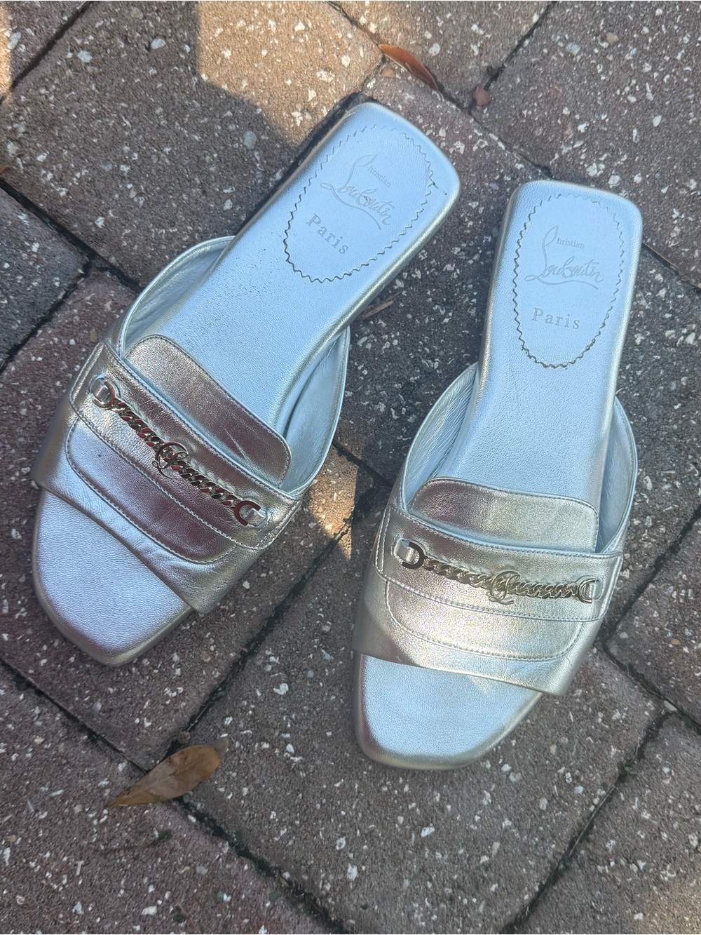 Louboutin Silver Slip-On Leather Slides with Chain Accent